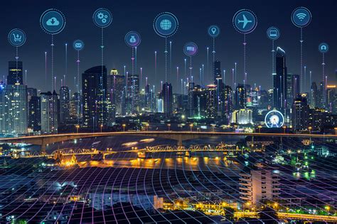 Night view of a modern city skyline with a bridge over water, overlaid with digital network connections and glowing icons for cloud, gears, global, and travel.