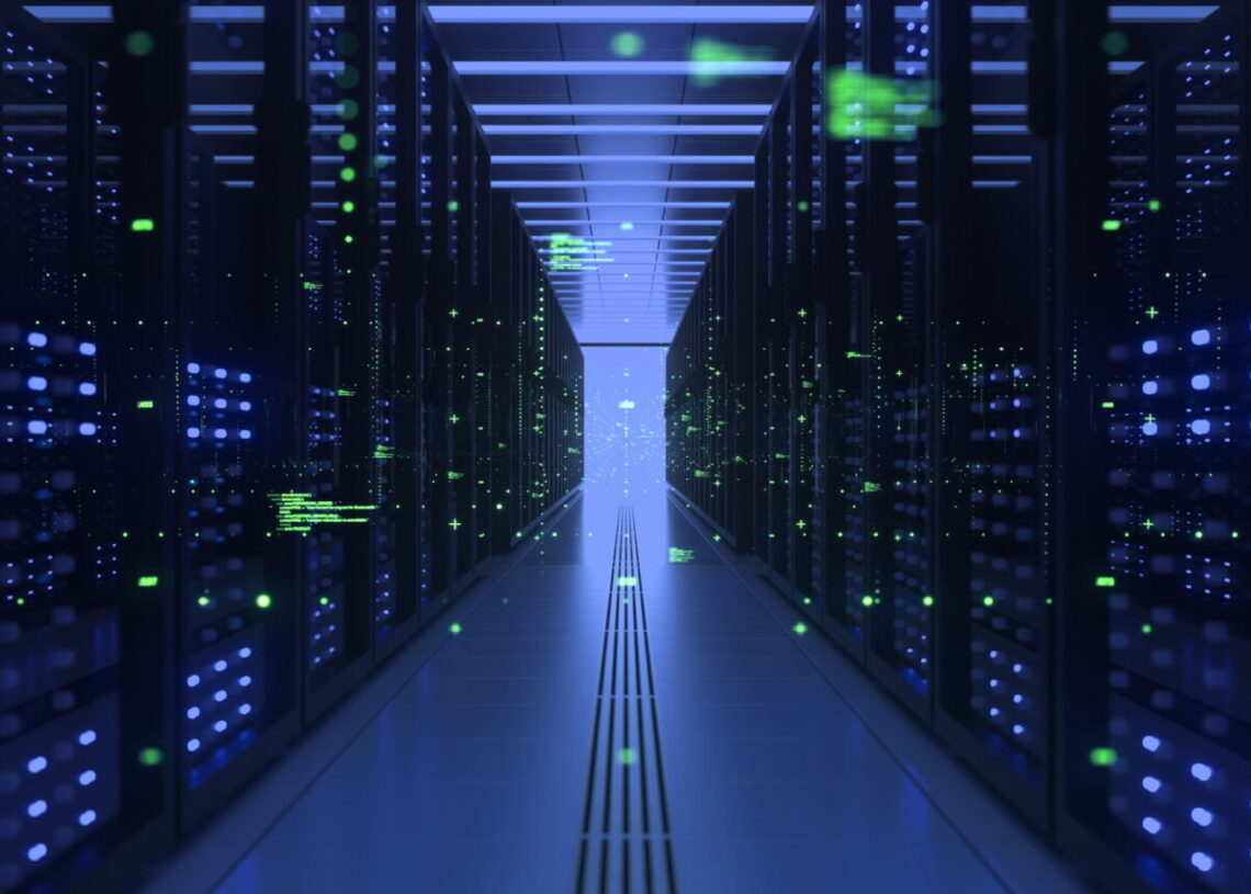 A symmetric perspective of an empty data center aisle, flanked by illuminated server cabinets on both sides, creating a tunnel effect and emphasizing scale and technology.
