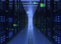 A symmetric perspective of an empty data center aisle, flanked by illuminated server cabinets on both sides, creating a tunnel effect and emphasizing scale and technology.